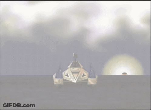 A Computer Generated Image Of A Pyramid In The Middle Of A Desert GIF