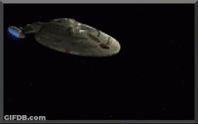 A Computer Generated Image Of A Space Ship With Blue Lights GIF