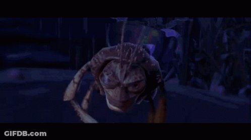 A Computer Generated Image Of A Spider With A Face GIF
