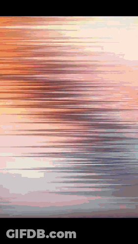 A Computer Generated Image Of A Sunset Over A Body Of Water . GIF