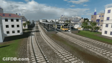A Computer Generated Image Of A Train Going Down Train Tracks GIF