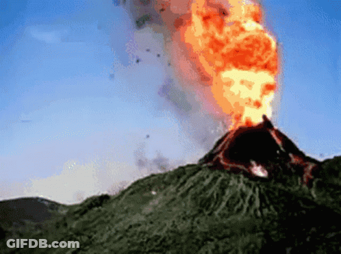 A Computer Generated Image Of A Volcano Erupting With Flames Coming Out Of It GIF