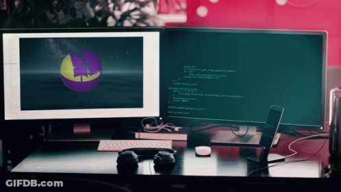 A Computer Monitor Displays A Purple And Yellow Sphere On The Screen GIF