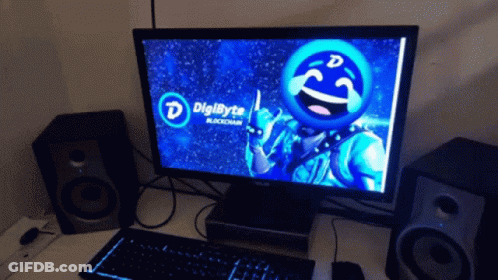 A Computer Monitor With A Smiley Face On It And The Word Digibyte GIF