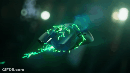 A Computer Mouse Is Glowing In The Dark And Has Arrows Pointing In Different Directions GIF