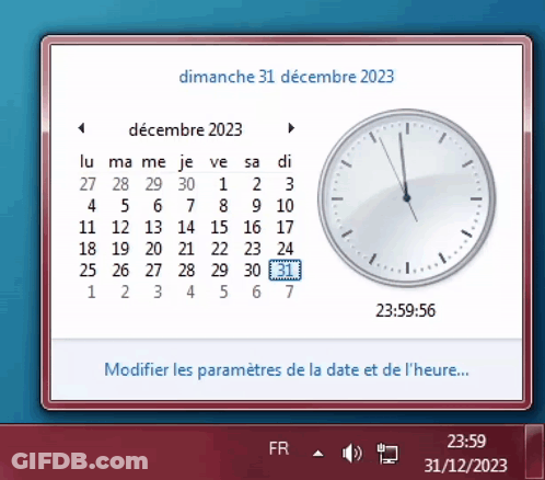 A Computer Screen Shows A Calendar And A Clock On Dimanche 31 Decembre 2023 GIF