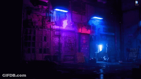 A Computer Screen Shows A Dark Alleyway At Night With Purple And Blue Lights GIF