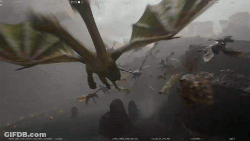 A Computer Screen Shows A Dragon Flying Over A Mountain GIF