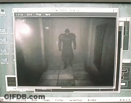 A Computer Screen Shows A Shadow Of A Man Walking Down A Hallway GIF