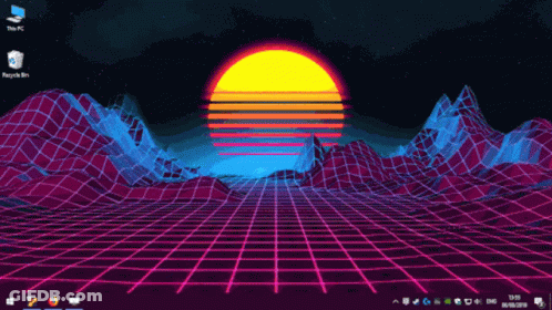 A Computer Screen Shows A Sunset Over A Grid GIF