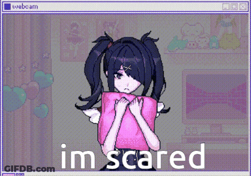 A Computer Screen With A Girl Holding A Pink Pillow And The Words Im Scared Below Her GIF