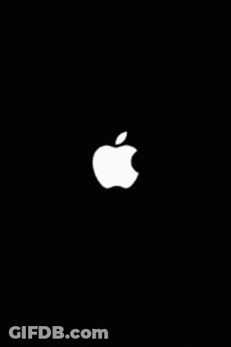 A Computer Screen With A Glitch Effect And A Picture Of An Apple GIF