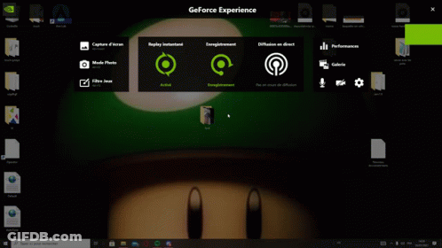 A Computer Screen With A Green Mushroom With A White Circle On It GIF