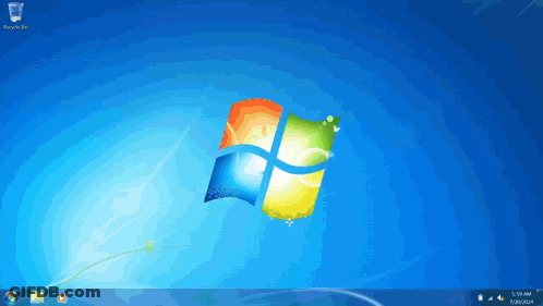 A Computer Screen With A Recycle Bin On The Left GIF