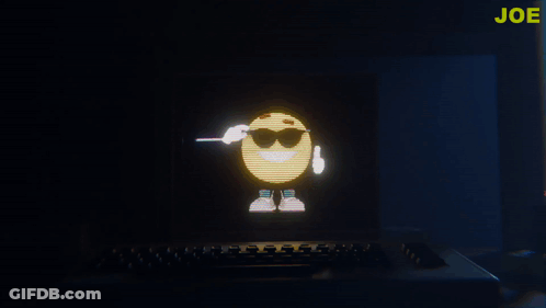 A Computer Screen With A Smiley Face And The Word Joe In Yellow GIF