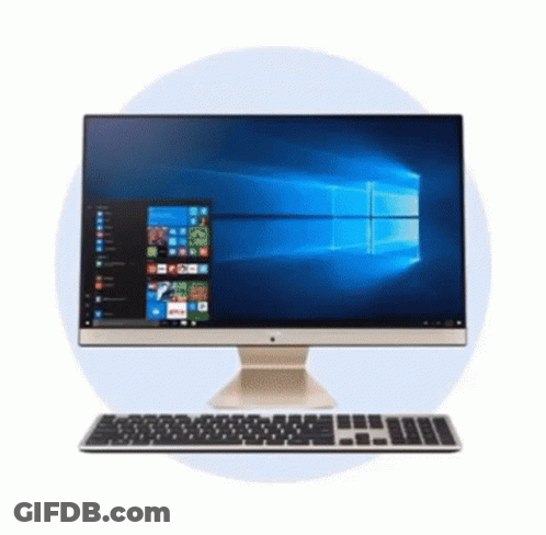 A Computer With A Keyboard And A Monitor Is Sitting In A Circle . GIF