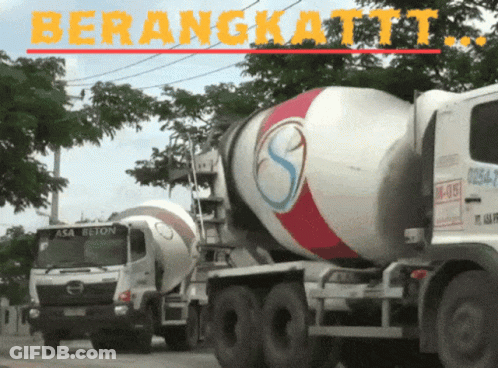 A Concrete Mixer Truck With The Word Berangkatt On It GIF