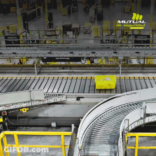 A Conveyor Belt In A Warehouse With The Word Robotic On It GIF