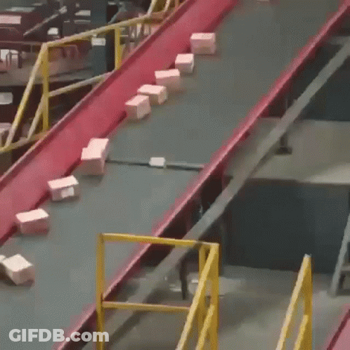 A Conveyor Belt With Boxes On It And One Of Them Has The Number 1 On It GIF