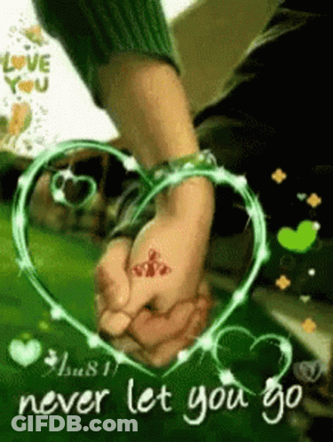 A Couple Holding Hands In Front Of A Heart That Says Never Let You Go . GIF