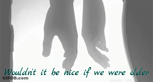 A Couple Holding Hands With The Words " Wouldn T It Be Nice If We Were Older " Below Them GIF