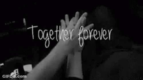 A Couple Is Holding Hands In A Black And White Photo With The Words `` Together Forever '' Written On It . GIF