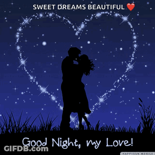 A Couple Kissing In Front Of A Heart That Says Good Night GIF