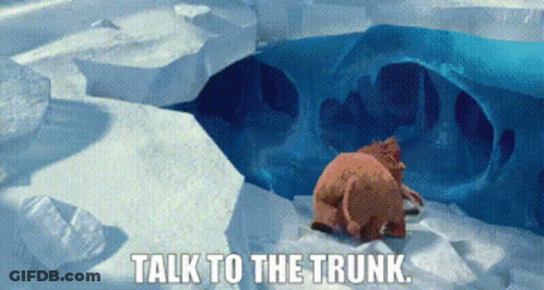 A Couple Of Animals Standing In The Snow With The Words Talk To The Trunk Below Them GIF