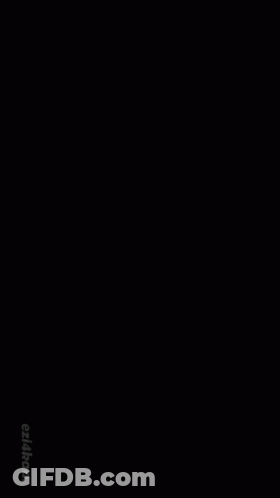 A Couple Of Anime Characters Are Laying In The Grass Together GIF