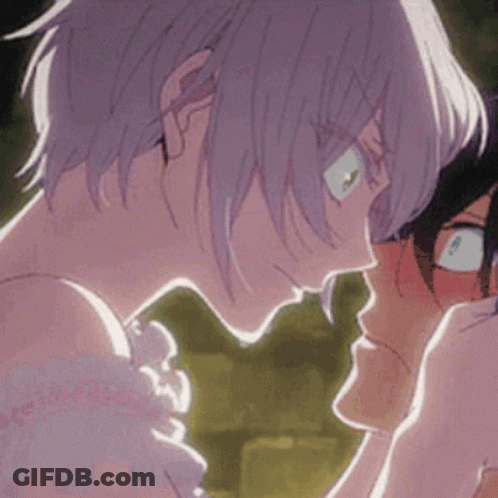 A Couple Of Anime Characters Are Looking At Each Other And Making A Heart Shape With Their Hands . GIF