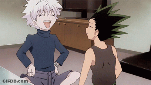 A Couple Of Anime Characters Are Sitting On The Floor One Is Laughing And The Other Has A Serious Look On His Face GIF