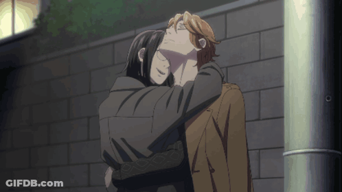 A Couple Of Anime Characters Hugging Each Other GIF