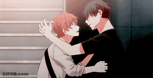 A Couple Of Anime Characters Hugging Each Other In A Staircase GIF