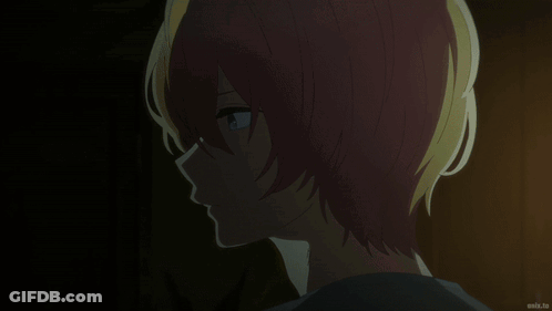 A Couple Of Anime Characters Hugging Each Other With A Blurred Background Behind Them GIF