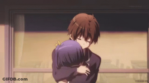 A Couple Of Anime Characters Hugging Each Other With Tokyo Mx On The Bottom Right GIF