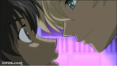 A Couple Of Anime Characters Looking At Each Other With A Pink Background GIF
