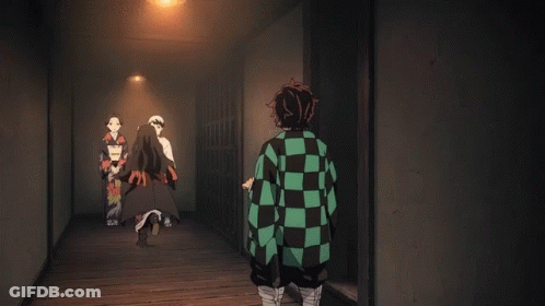 A Couple Of Anime Characters Standing Next To Each Other One Of Which Has Purple Eyes GIF