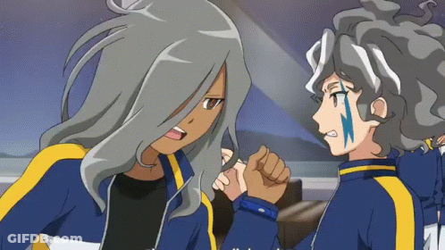 A Couple Of Anime Characters Standing Next To Each Other With One Having A Lightning Bolt On His Face GIF
