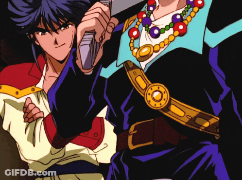 A Couple Of Anime Characters Standing Next To Each Other With One Holding A Sword GIF