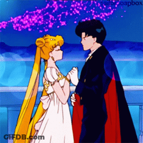 A Couple Of Anime Characters Standing Next To Each Other With The Words Sailor Soapbox In The Bottom Right Corner GIF