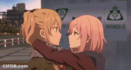 A Couple Of Anime Girls Are Hugging Each Other And Kissing . GIF