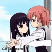 A Couple Of Anime Girls Are Hugging Each Other . GIF