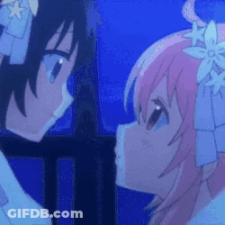 A Couple Of Anime Girls Are Standing Next To Each Other And Kissing . GIF