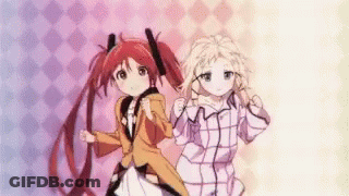 A Couple Of Anime Girls Are Standing Next To Each Other On A Pink And Blue Background . GIF