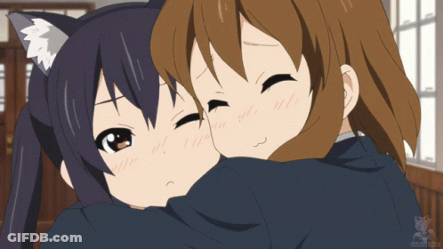 A Couple Of Anime Girls Hugging Each Other With A Fox Logo In The Corner GIF