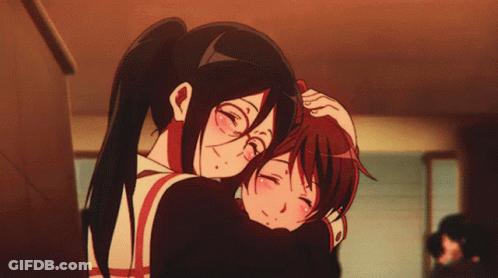 A Couple Of Anime Girls Hugging Each Other With One Girl Holding The Other 'S Head GIF