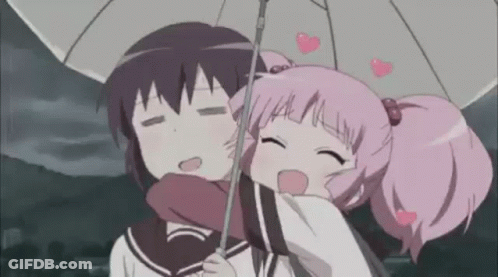 A Couple Of Anime Girls Hugging Under An Umbrella . GIF