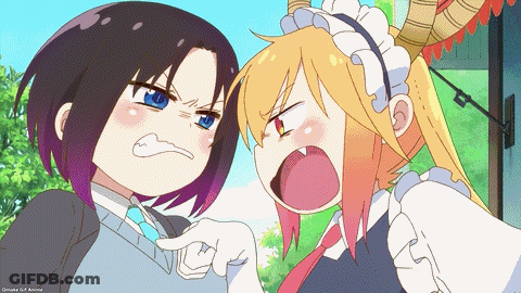 A Couple Of Anime Girls Standing Next To Each Other With One Pointing GIF