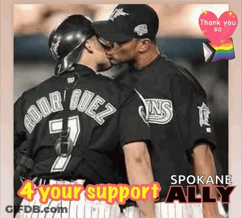 A Couple Of Baseball Players Kissing With The Words Spokane 4 Your Support Ally GIF