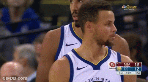 A Couple Of Basketball Players Are Standing Next To Each Other On The Court . GIF